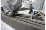 Préfabrication en usine d'un des 10 prototypes de maison imprimée en 3D, société WinSun en Chine - Crédit photo : DR  