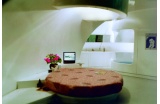 Vue de la chambre de la maison escargot conçue par le designer Pierre Colleu. - Crédit photo : DR  